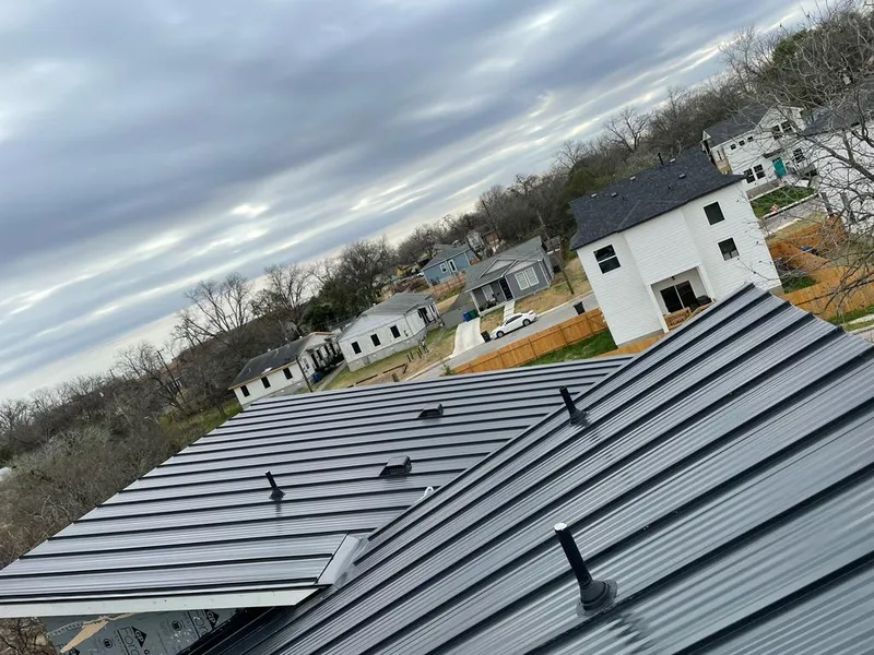 Standing seam metal roof panels with vents for Skylight Repair in Garden City